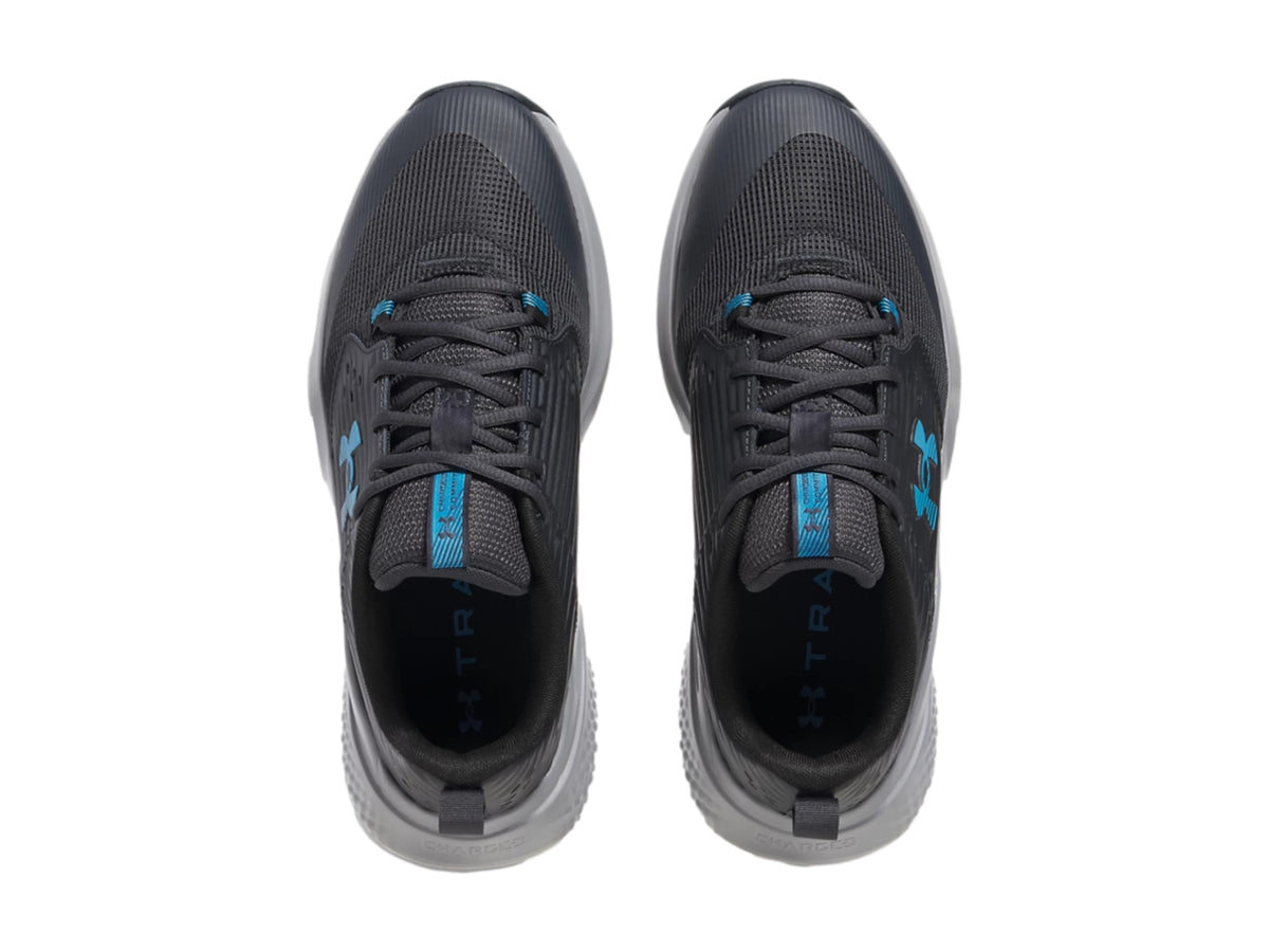 Tenis Under Armour Charged Commit TR 4 Gris para Hombre
